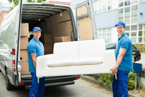 Removal team planning a move in Edgware with boxes and furniture