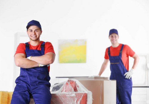 Local team collecting a sofa and wardrobe during furniture removal
