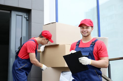 Professional removal team handling household furniture in Edgware