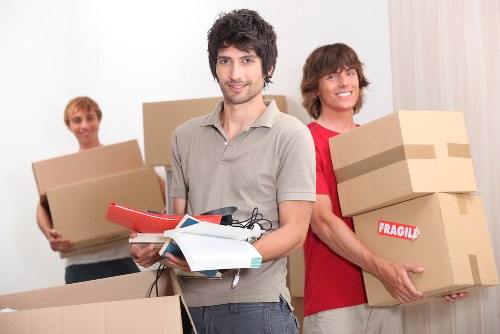 Packing boxes and wrapping materials prepared for a local move in Edgware