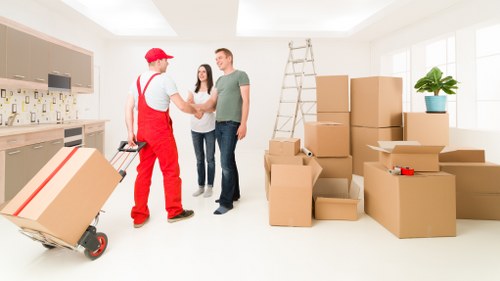 Office furniture and equipment being prepared for relocation