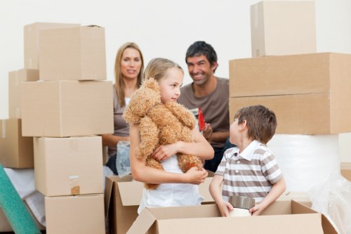 Preparing packed boxes and furniture for transport with a removal van in Edgware